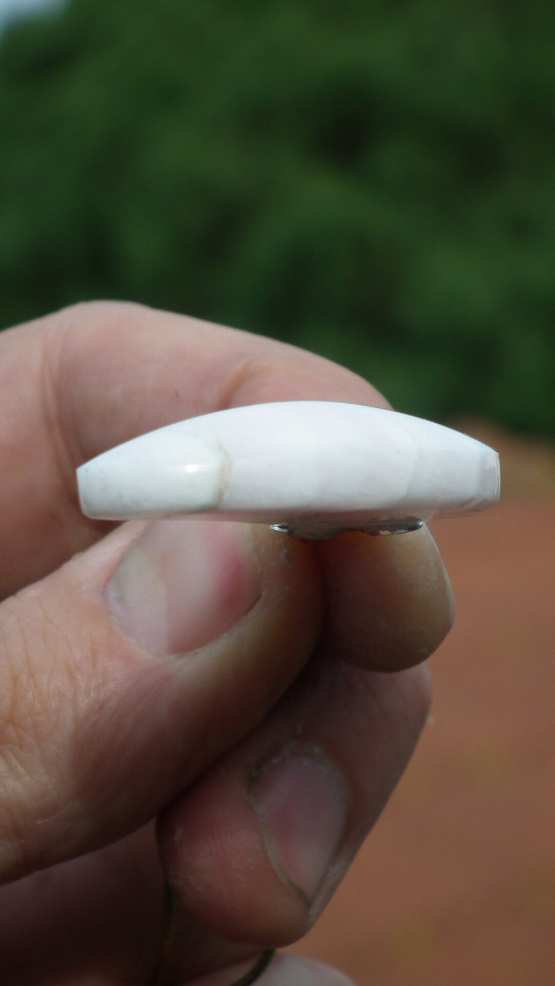 Mangano calcite pendant with silverplated