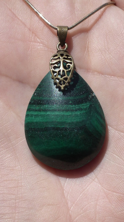 Malachite pendant with bronze bail