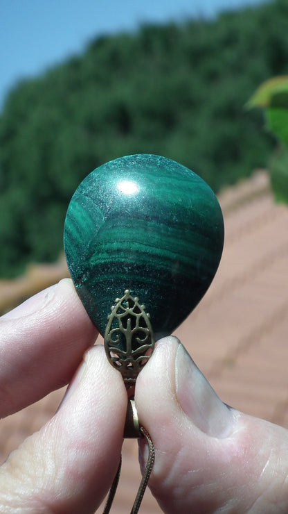 Malachite pendant with bronze bail