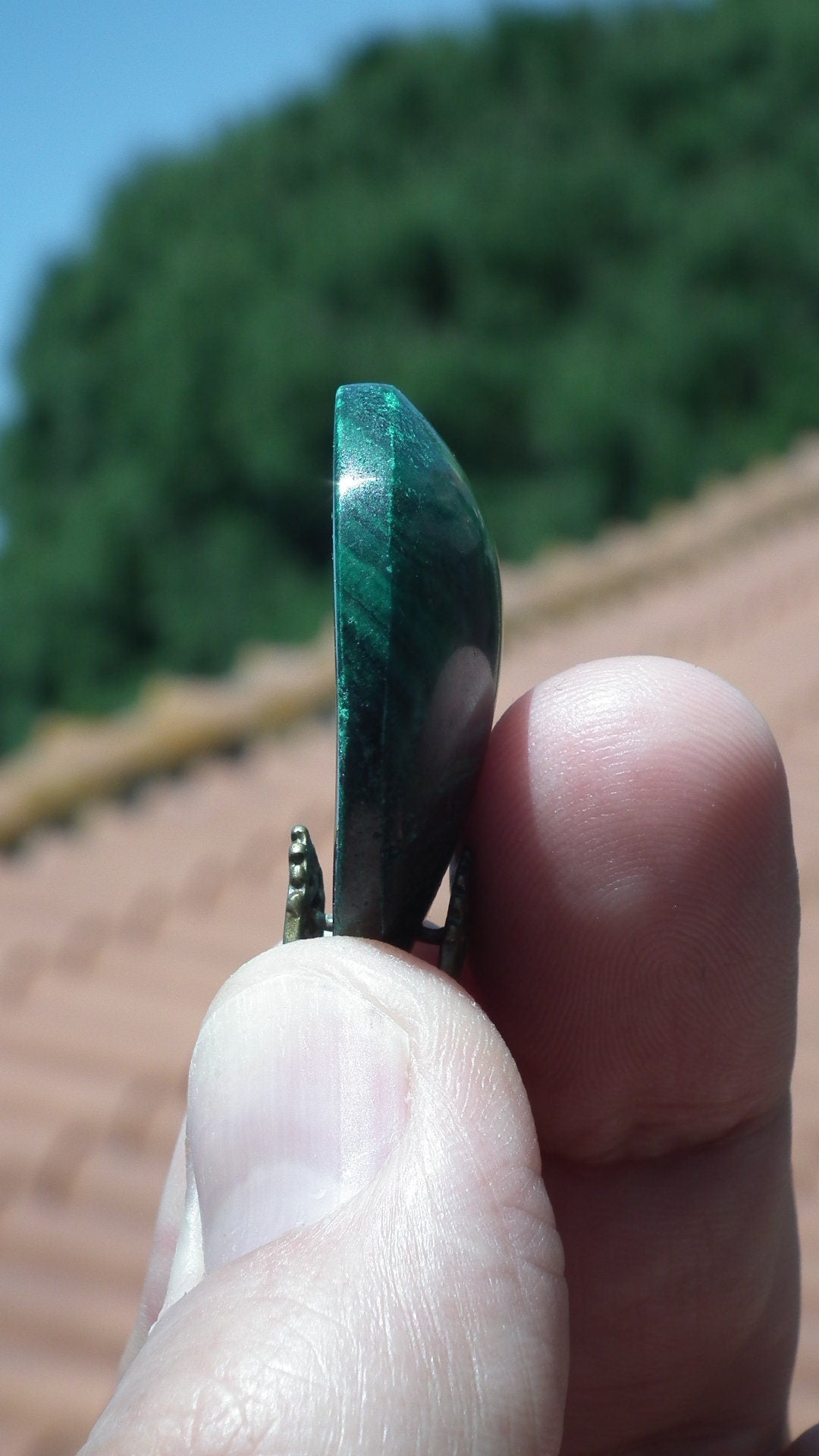 Malachite pendant with bronze bail