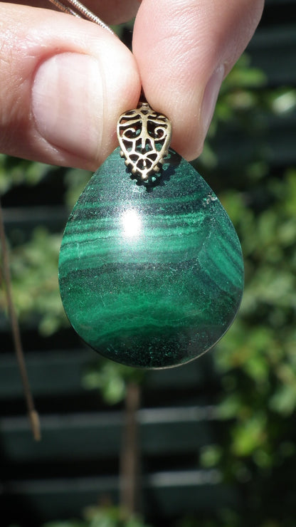 Malachite pendant with bronze bail