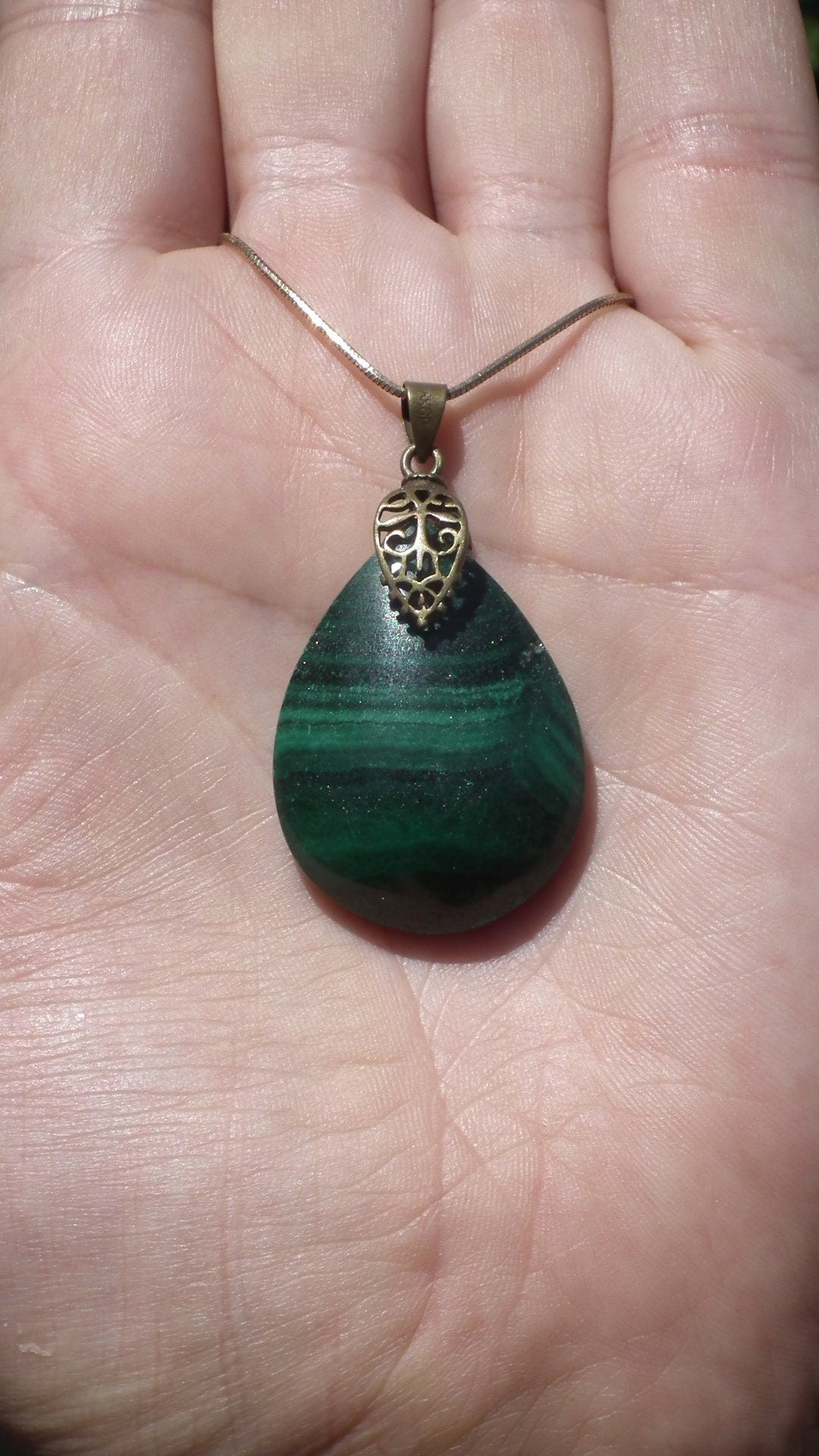 Malachite pendant with bronze bail