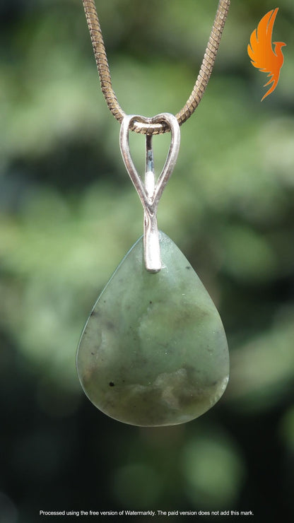 Nephrite jade pendant with sterling silver bail