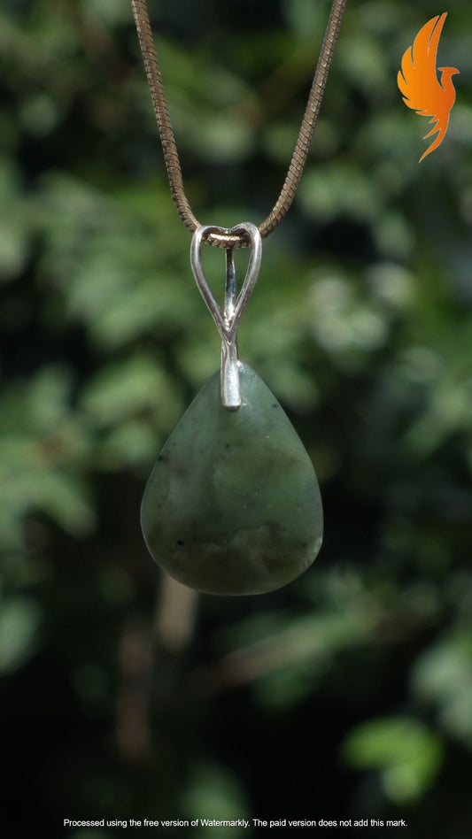 Nephrite jade pendant with sterling silver bail