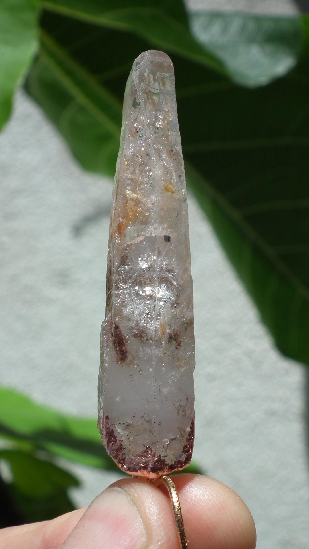 Uv reactive crystal pendant // Petroleum quartz // Terminated quartz