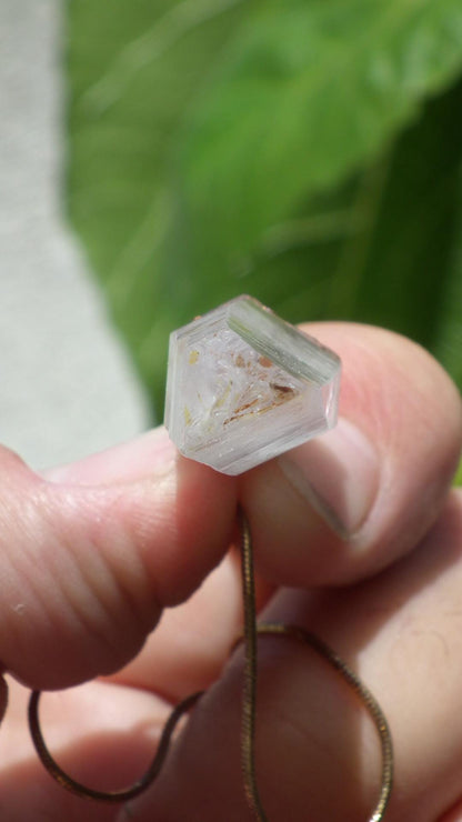 Uv reactive crystal pendant // Petroleum quartz // Terminated quartz