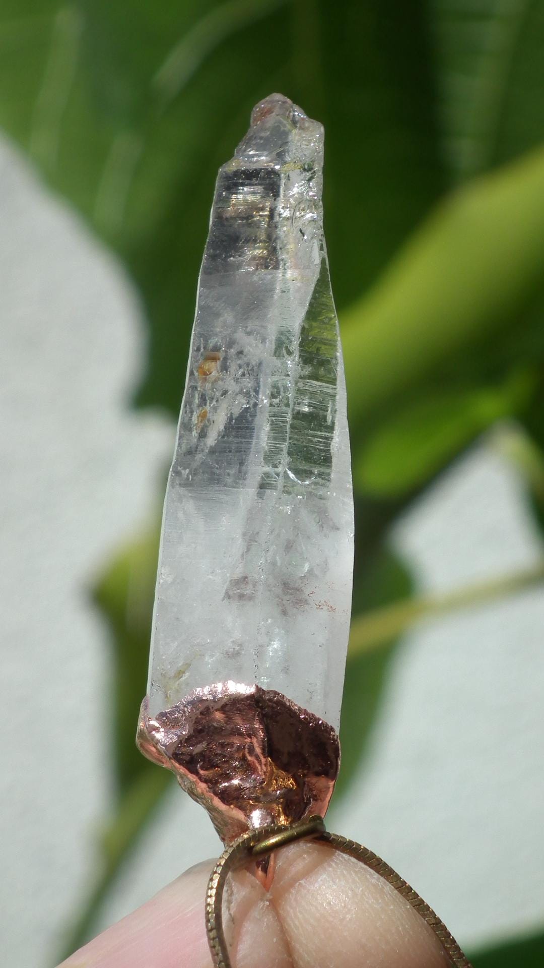 Uv reactive crystal pendant // Petroleum quartz // Terminated quartz