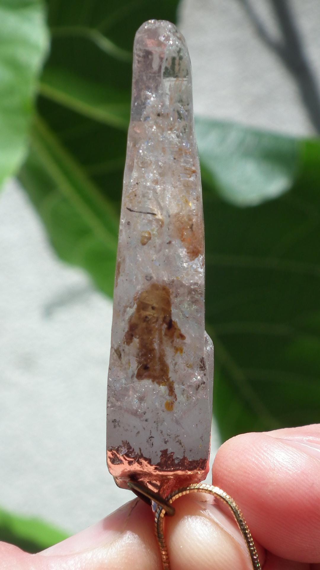 Uv reactive crystal pendant // Petroleum quartz // Terminated quartz