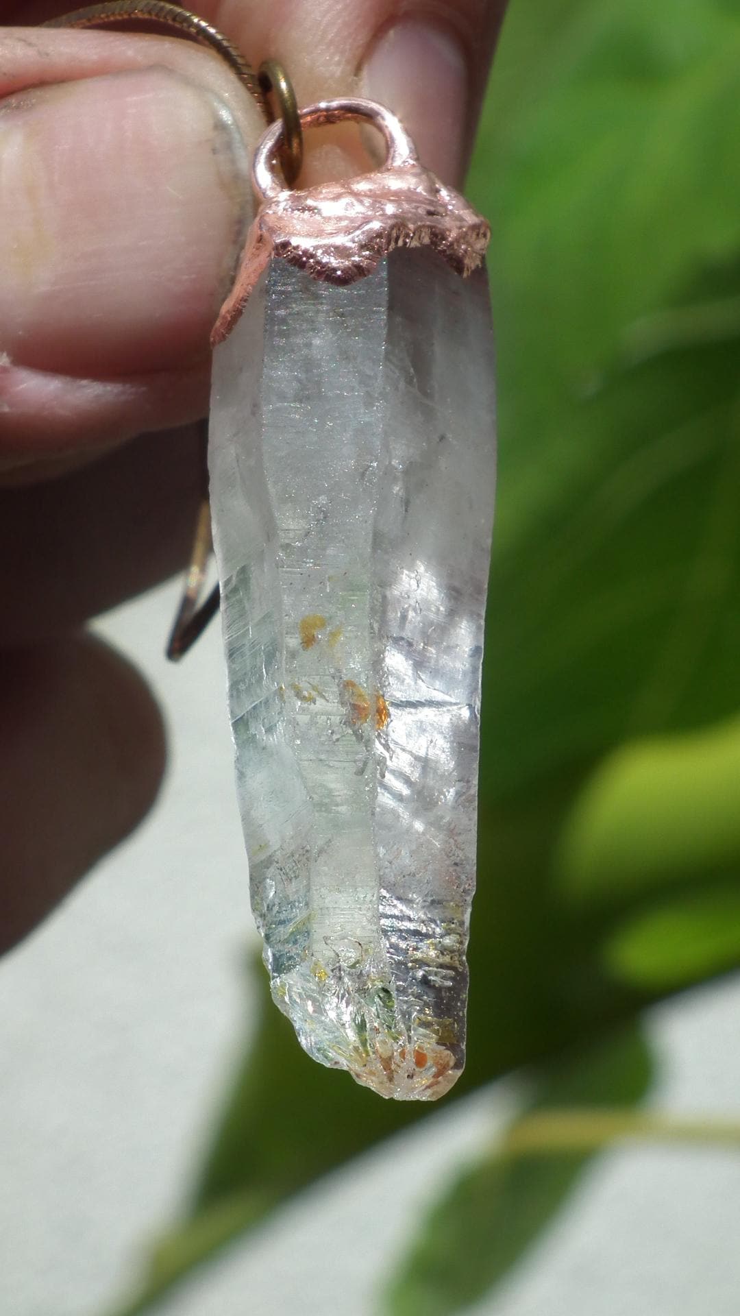 Uv reactive crystal pendant // Petroleum quartz // Terminated quartz