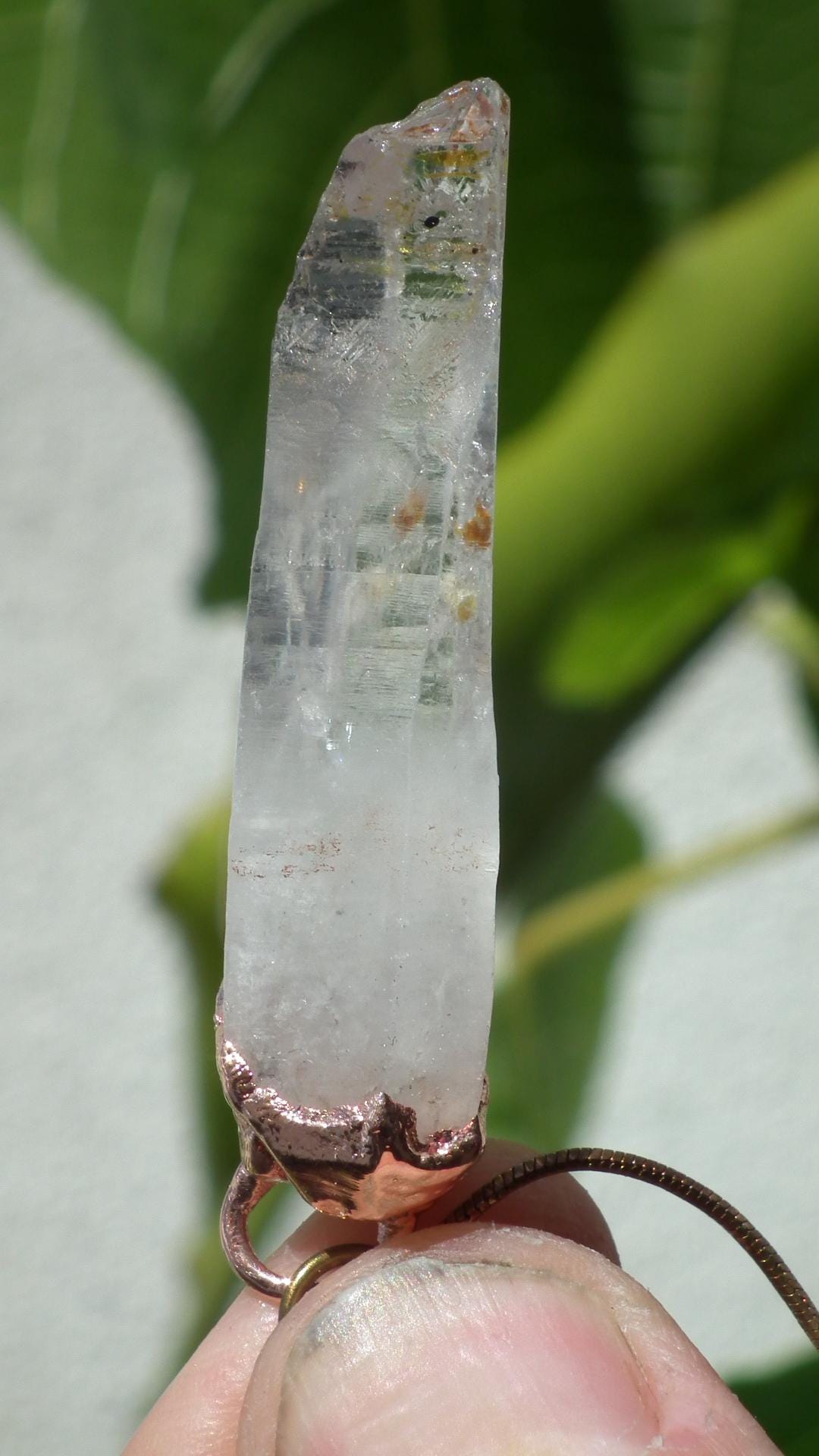 Uv reactive crystal pendant // Petroleum quartz // Terminated quartz