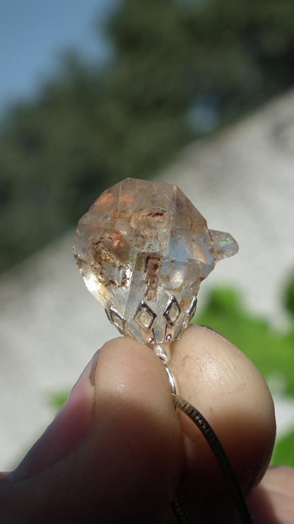 Uv reactive crystal pendant // Petroleum quartz // Terminated quartz