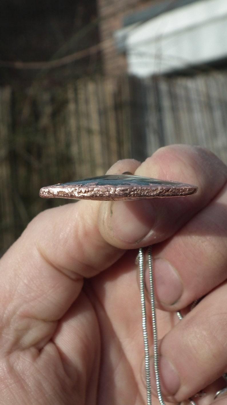 Copper formed Mossagate pendant