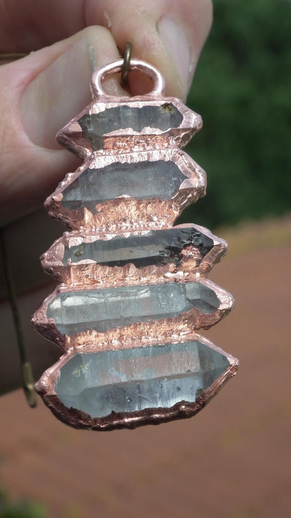 Double terminated Quartz pendant