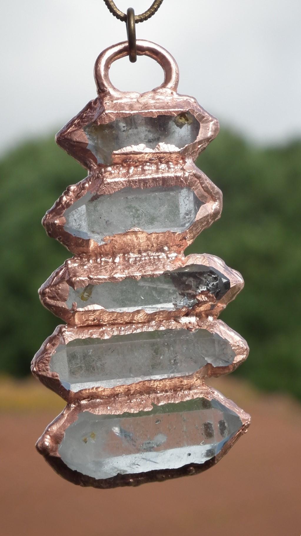 Double terminated Quartz pendant