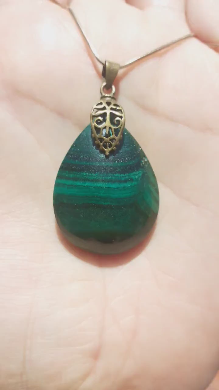 Malachite pendant with bronze bail