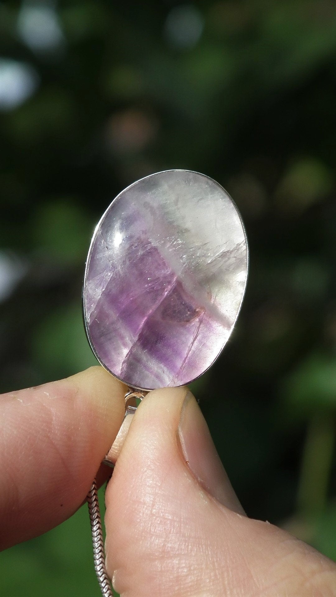 Fluorite pendant in sterling silver setting