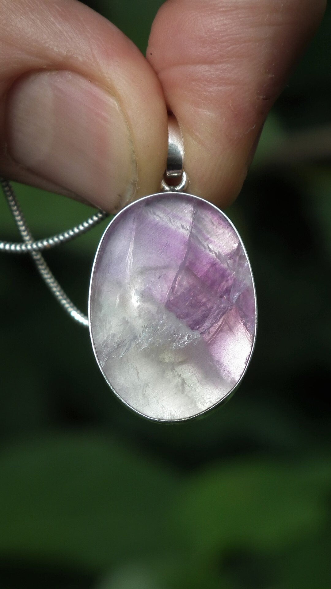 Fluorite pendant in sterling silver setting