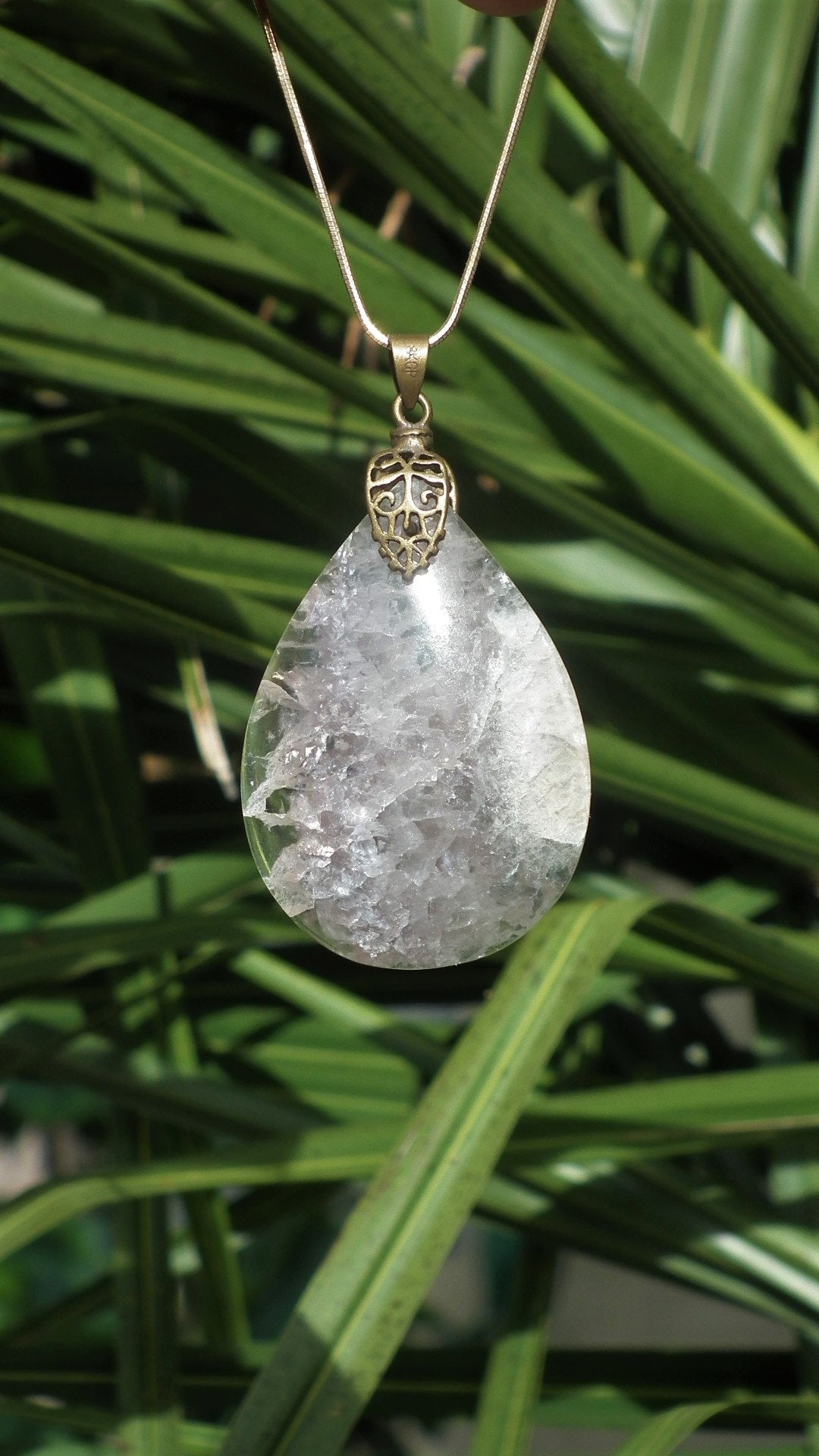 Fluorite pendant with bronze bail