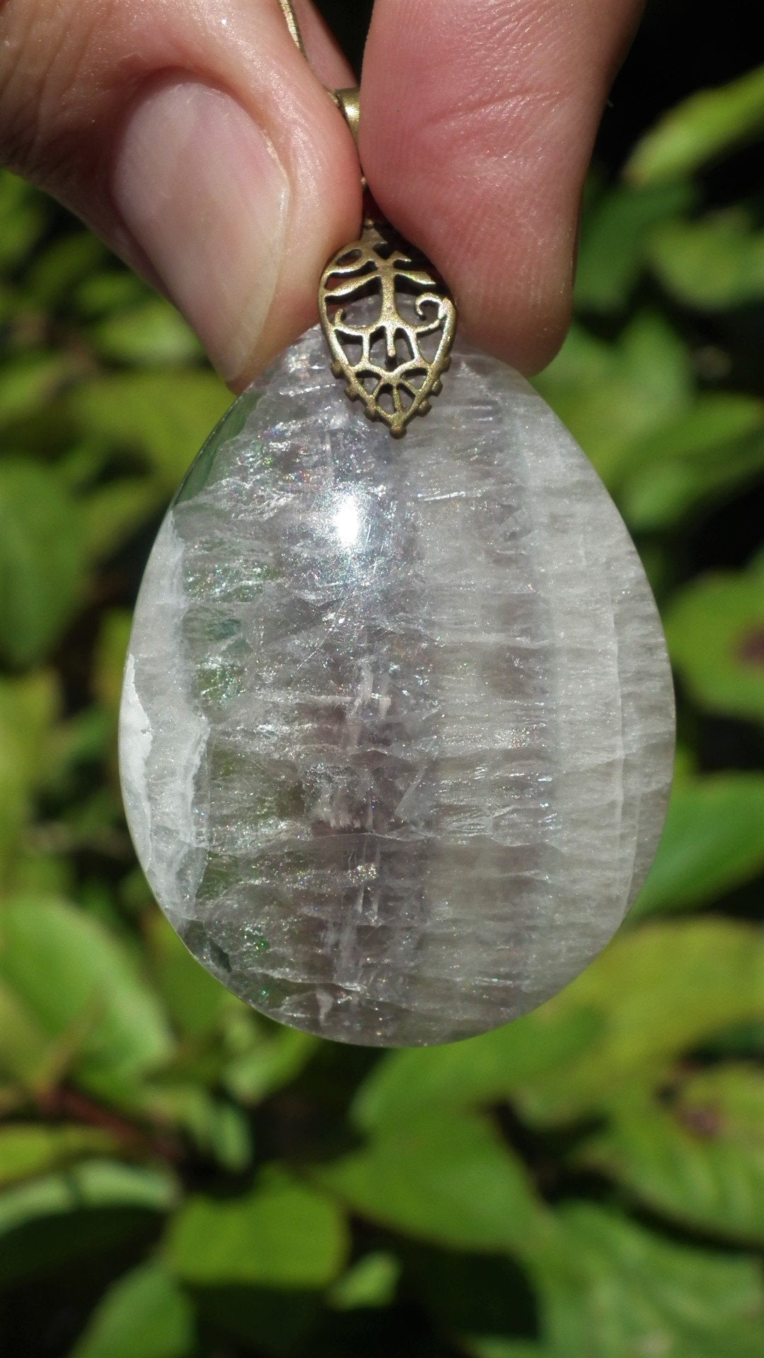 Fluorite pendant with bronze bail