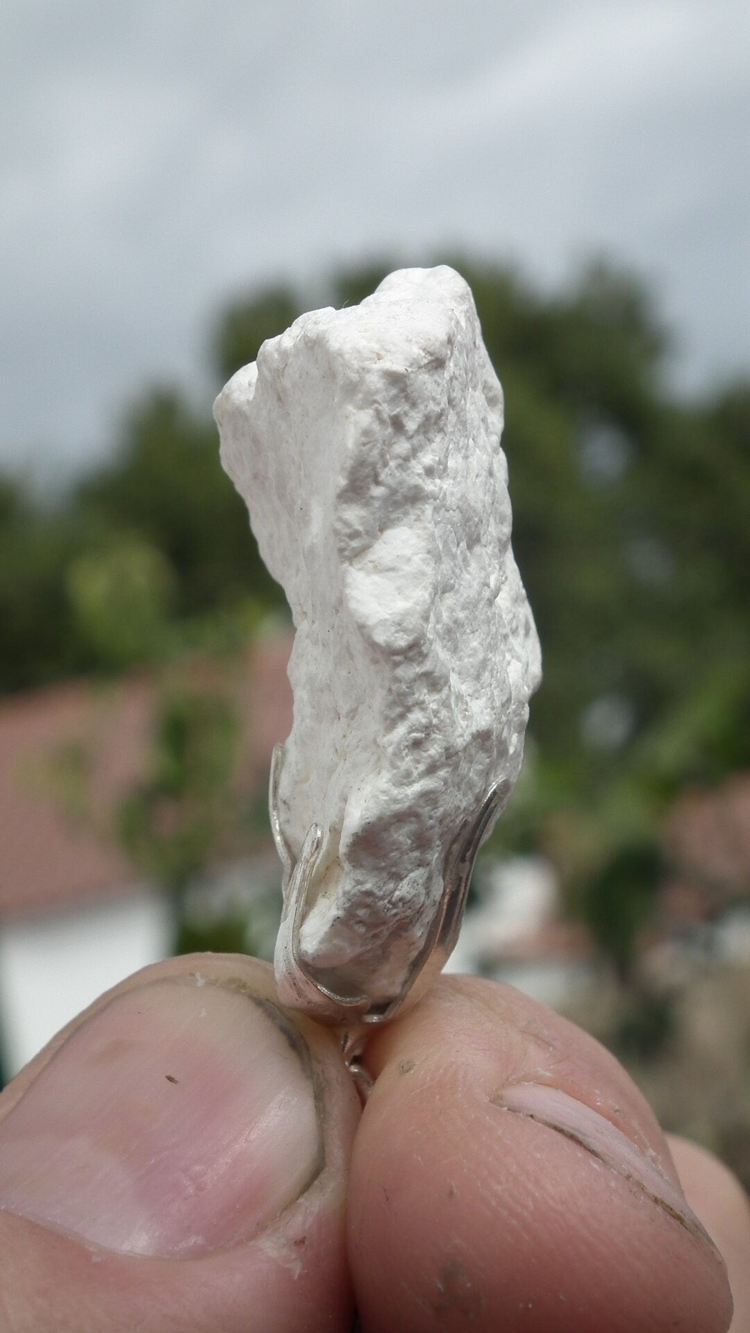 Natural rough magnesite pendant with silverplated bail