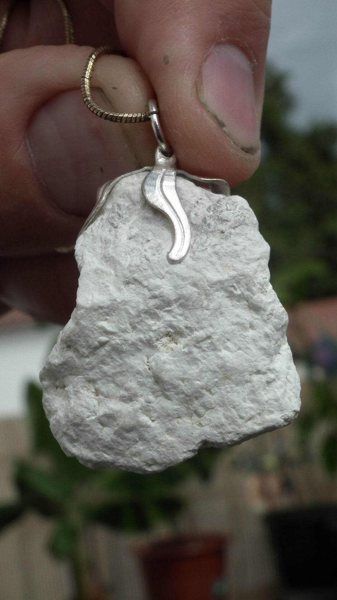 Natural rough magnesite pendant with silverplated bail