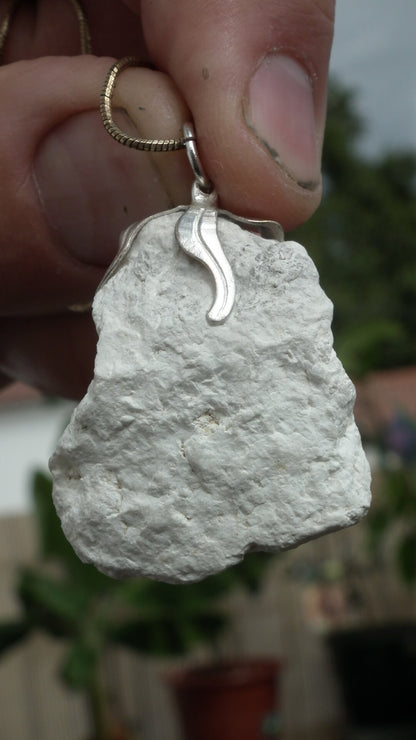 Natural rough magnesite pendant with silverplated bail