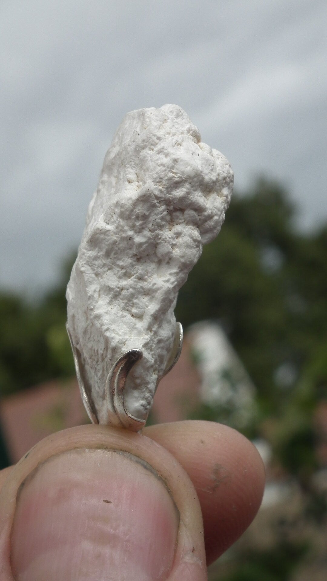 Natural rough magnesite pendant with silverplated bail