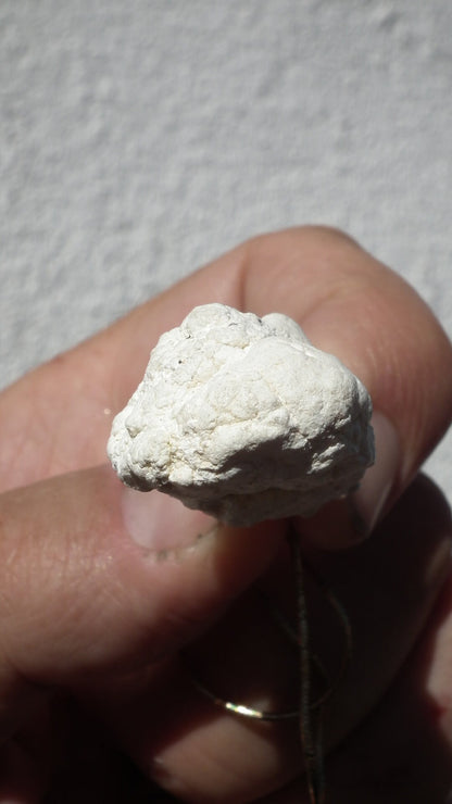 Natural rough magnesite pendant with silverplated bail