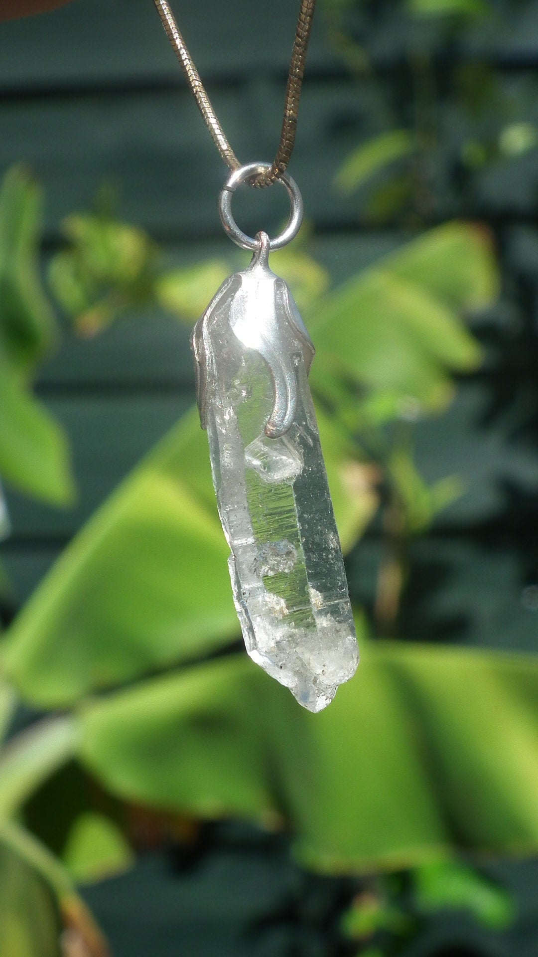 Double terminated Quartz pendant