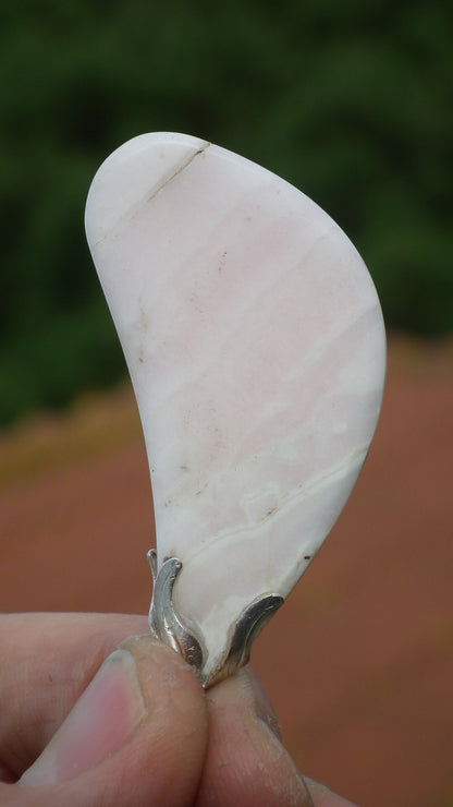 Mangano calcite pendant with silverplated