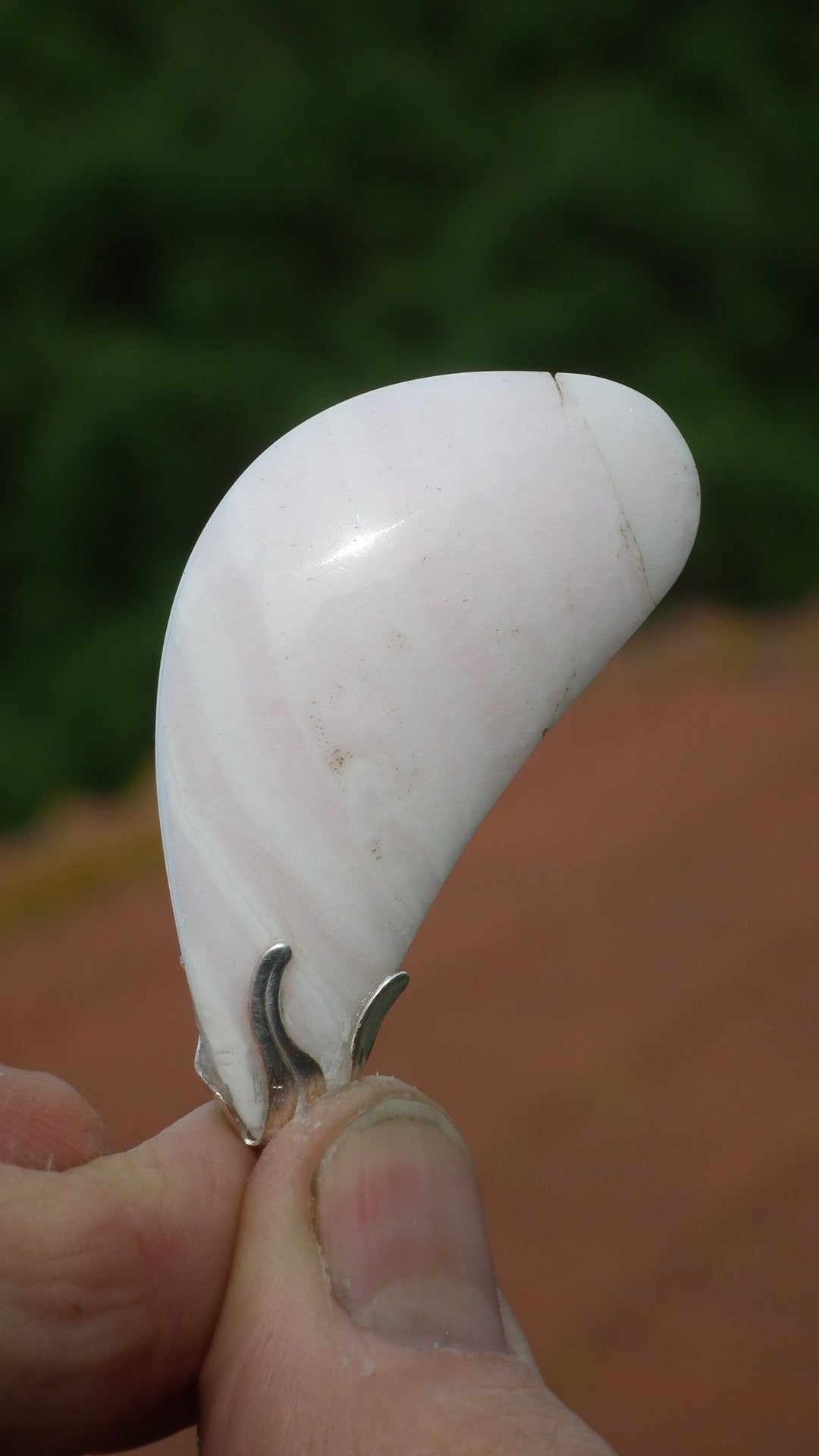 Mangano calcite pendant with silverplated