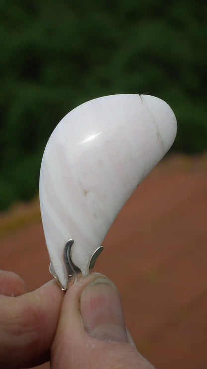 Mangano calcite pendant with silverplated