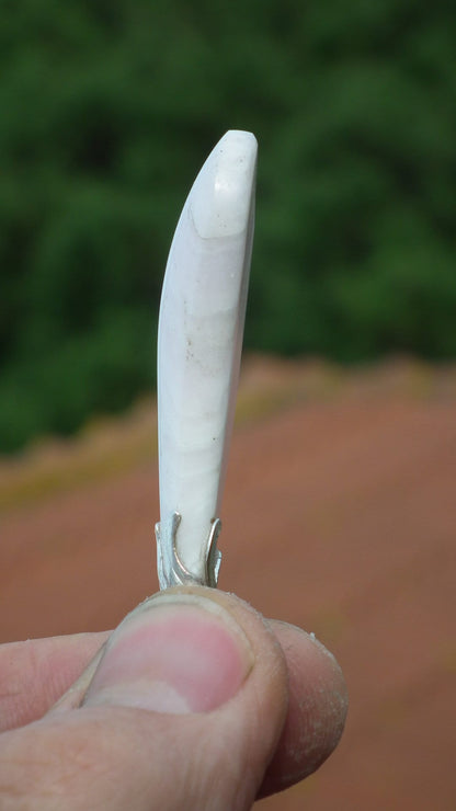 Mangano calcite pendant with silverplated