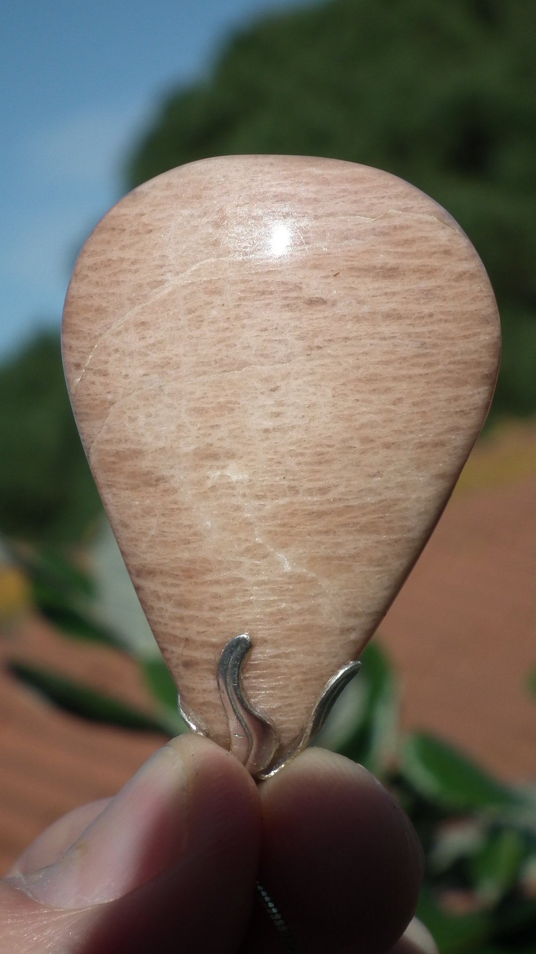 Peach moonstone necklace with silverplated bail